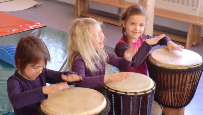 children drumming